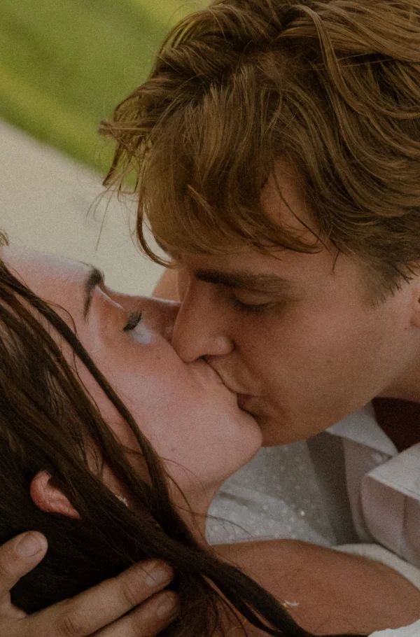 Groom dip kissing bride