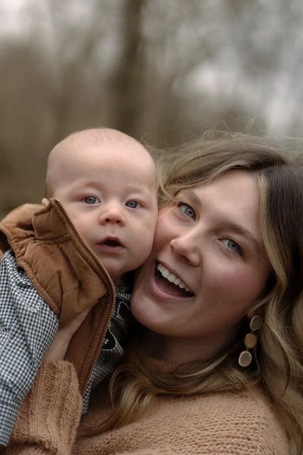 A mother holding her baby