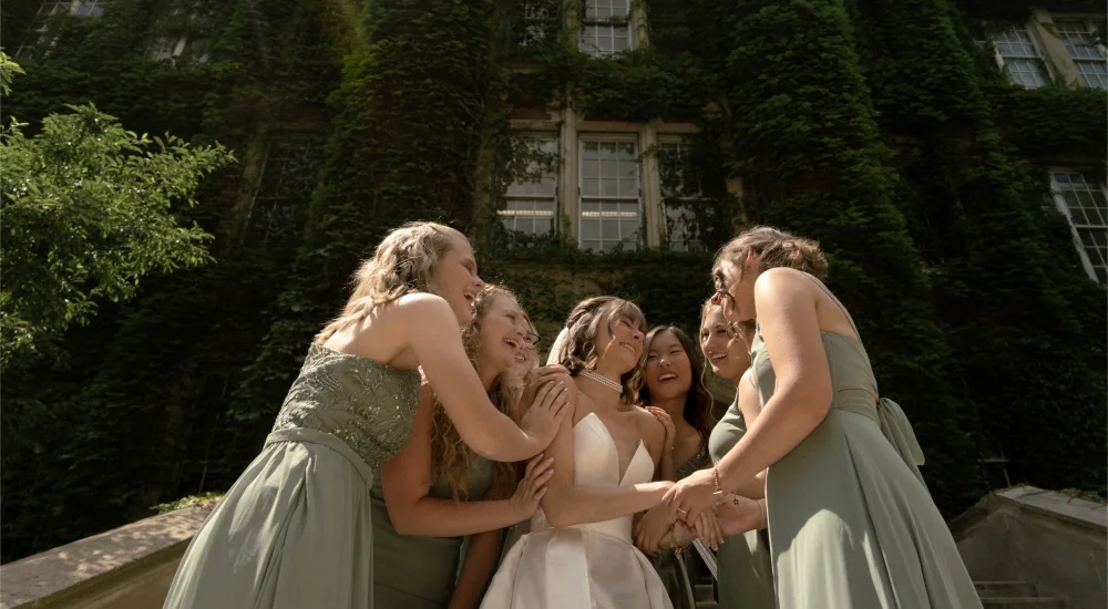 Bridal party celebrating with the bride.